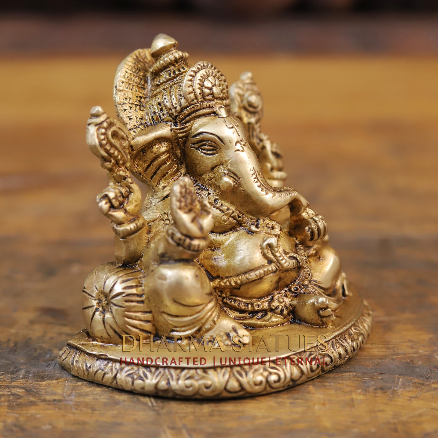 Brass Ganesha Statue, Seated On a Round Base, Fine Golden Finish
