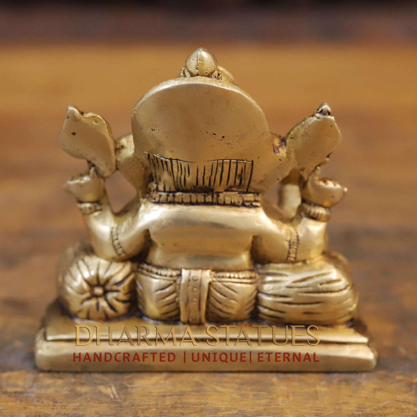 Brass Ganesha Statue, Seated On a Round Base, Fine Golden Finish