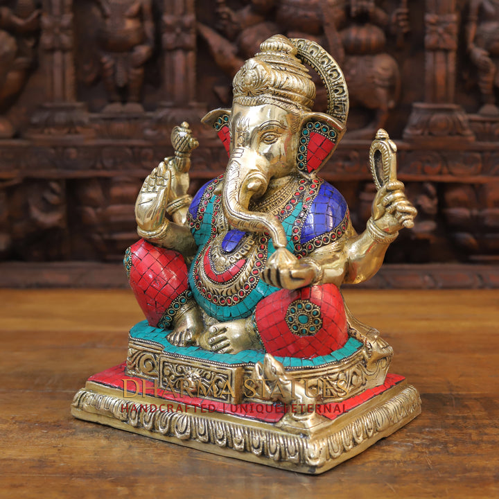 Brass Ganesh seated with rat in square base, Stonework, 12.5”