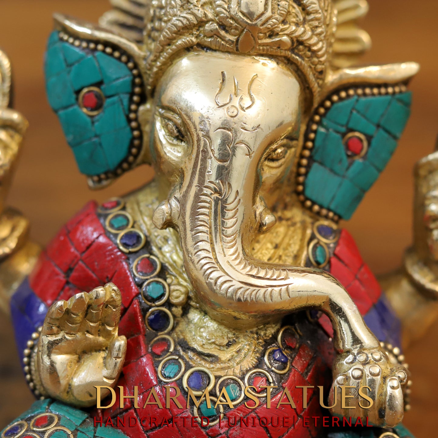 Brass Ganesh seated with tilted neck, Golden & Stone work, 5.5"