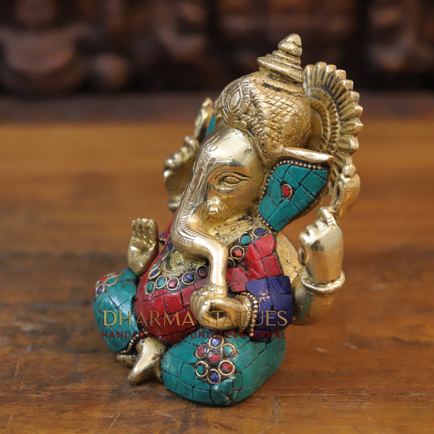 Brass Ganesh seated with tilted neck, Golden & Stone work, 5.5"