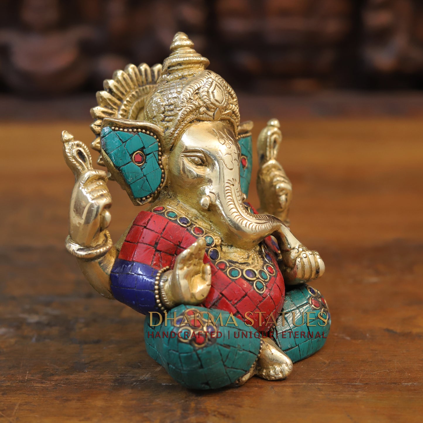 Brass Ganesh seated with tilted neck, Golden & Stone work, 5.5"