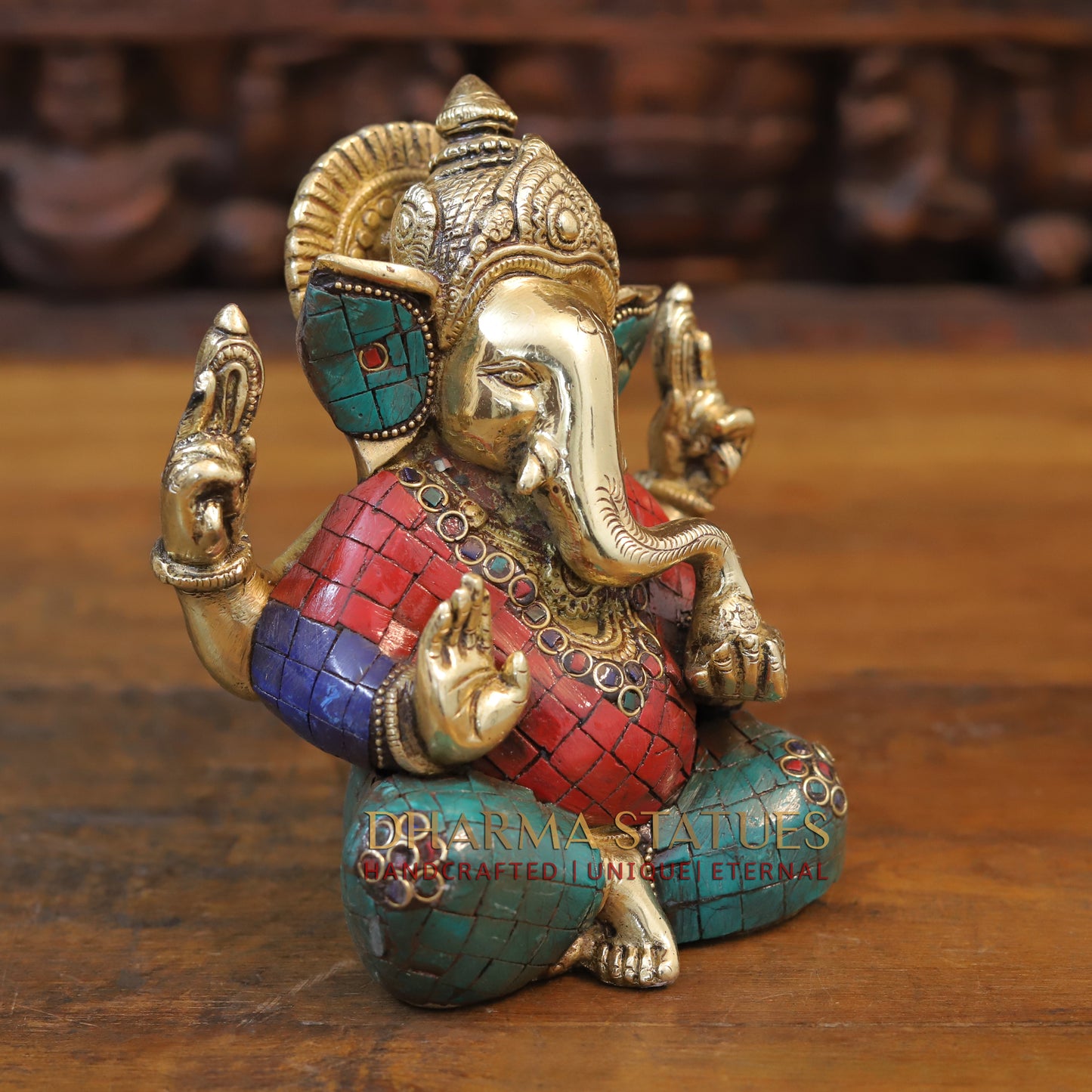 Brass Ganesh seated with tilted neck, Golden & Stone work, 7"