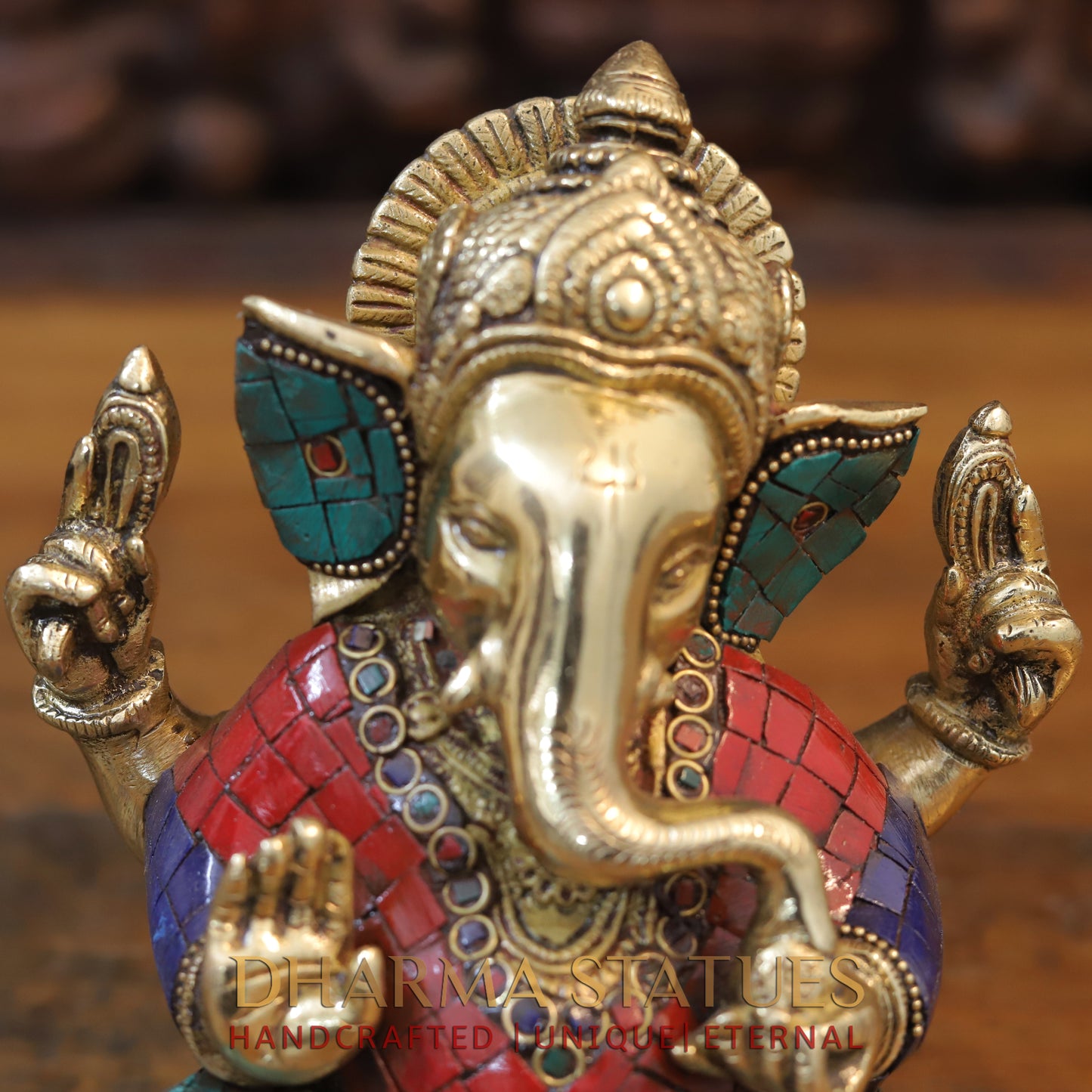 Brass Ganesh seated with tilted neck, Golden & Stone work, 7"