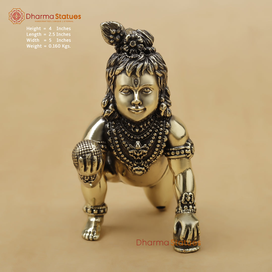 Small statue of a deity with detailed jewelry on a beige background, branded 'Dharma Statues'.