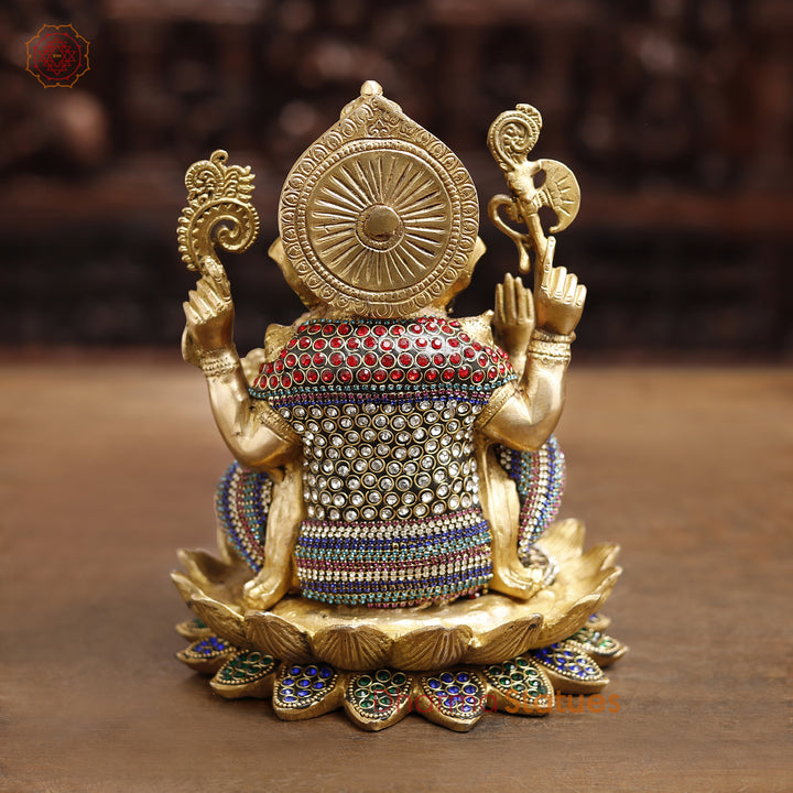 Brass Lord Ganesha Idol, Seated in a Blessing Posture, Golden & Stone work 9.5"