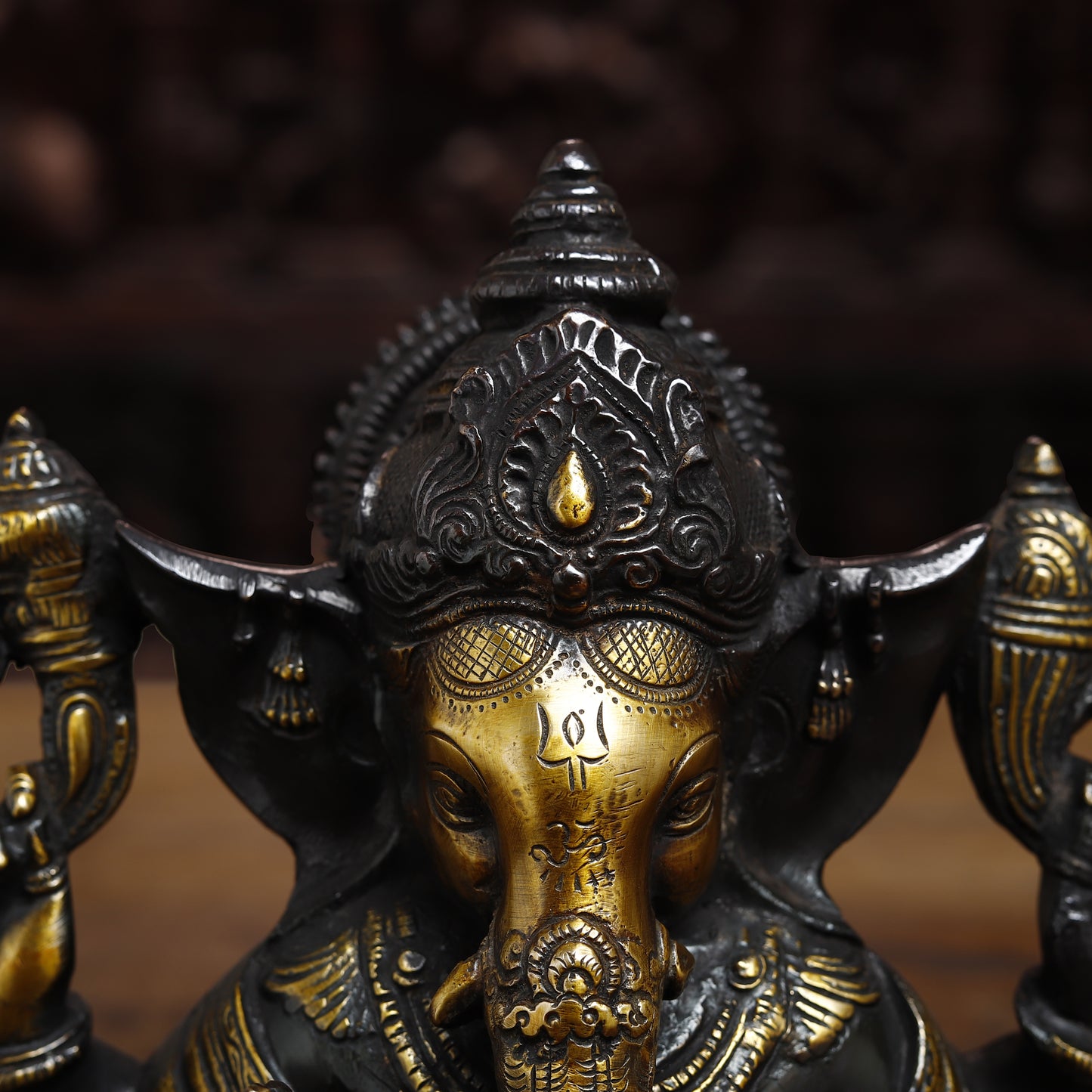 Brass Ganesh seated in Blessing Posture, Golden & Black Patina, 8.5"