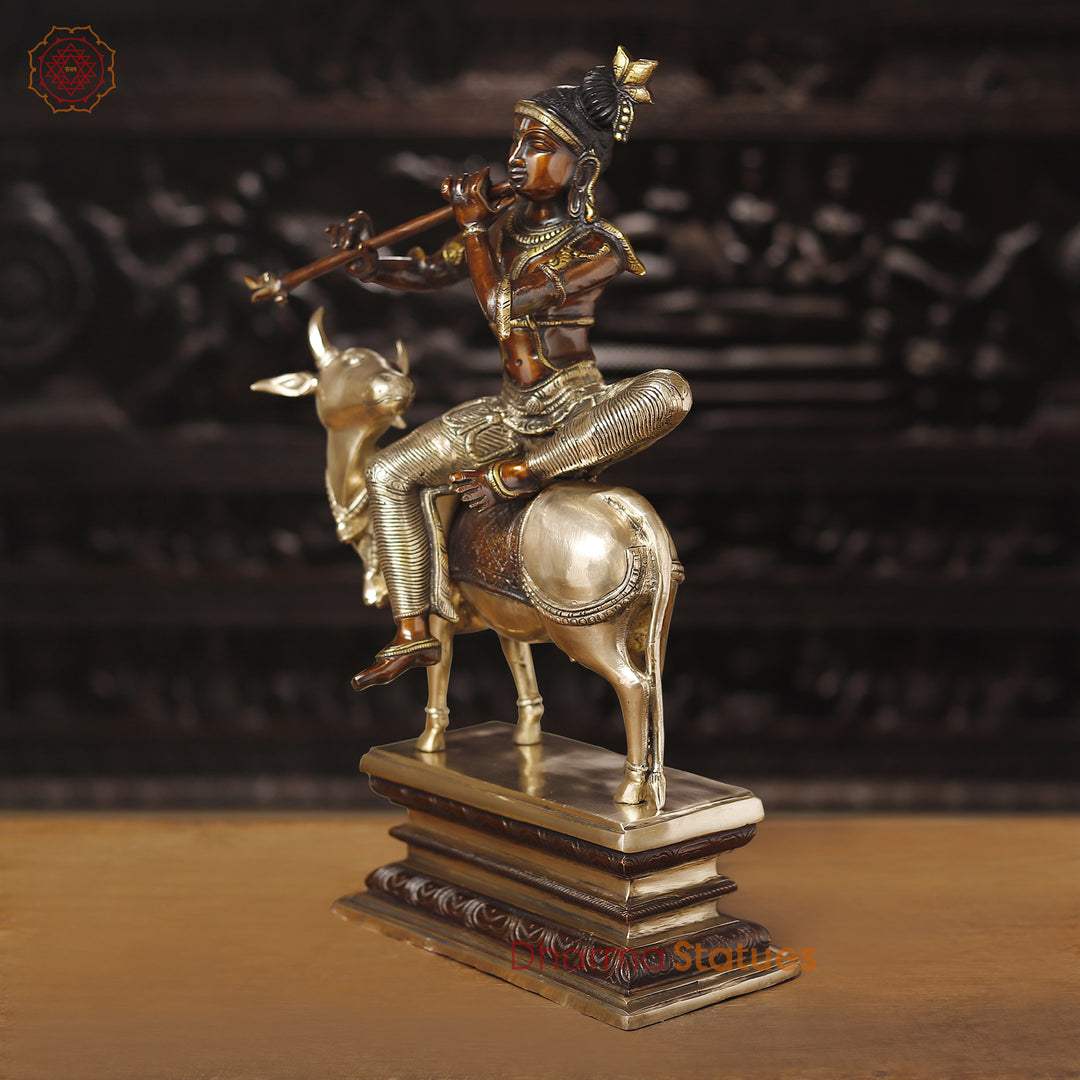 Brass Krishna Statue, Seated on a Cow, Golden & Copper Finish, 21"