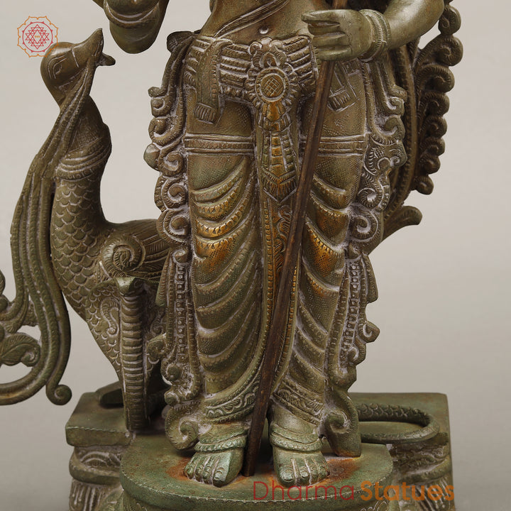 Brass Kartik Standing With Peacock, Antique Green Finish, 16.5"