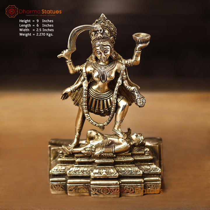 Brass Kali Idol- Goddess Kali Standing On Lord Shiva's Chest, Golden Finish 9"