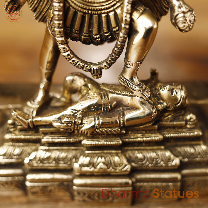 Brass Kali Idol- Goddess Kali Standing On Lord Shiva's Chest, Golden Finish 9"