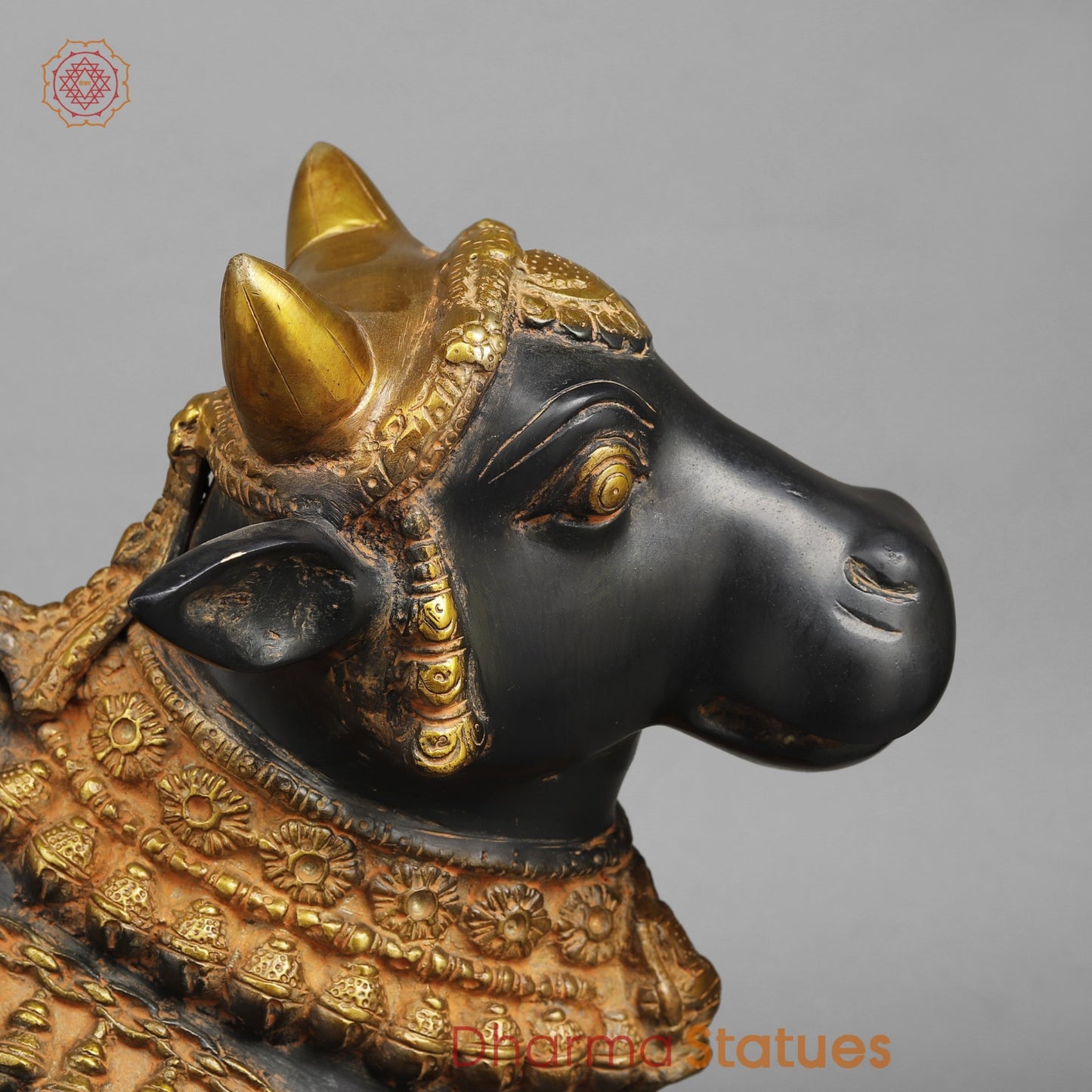 Brass Nandi seated, Deep Black and Gold finish 16.5”