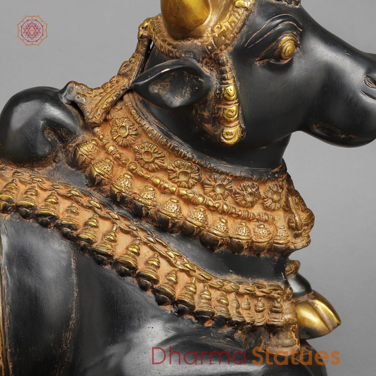 Brass Nandi seated, Deep Black and Gold finish 16.5”