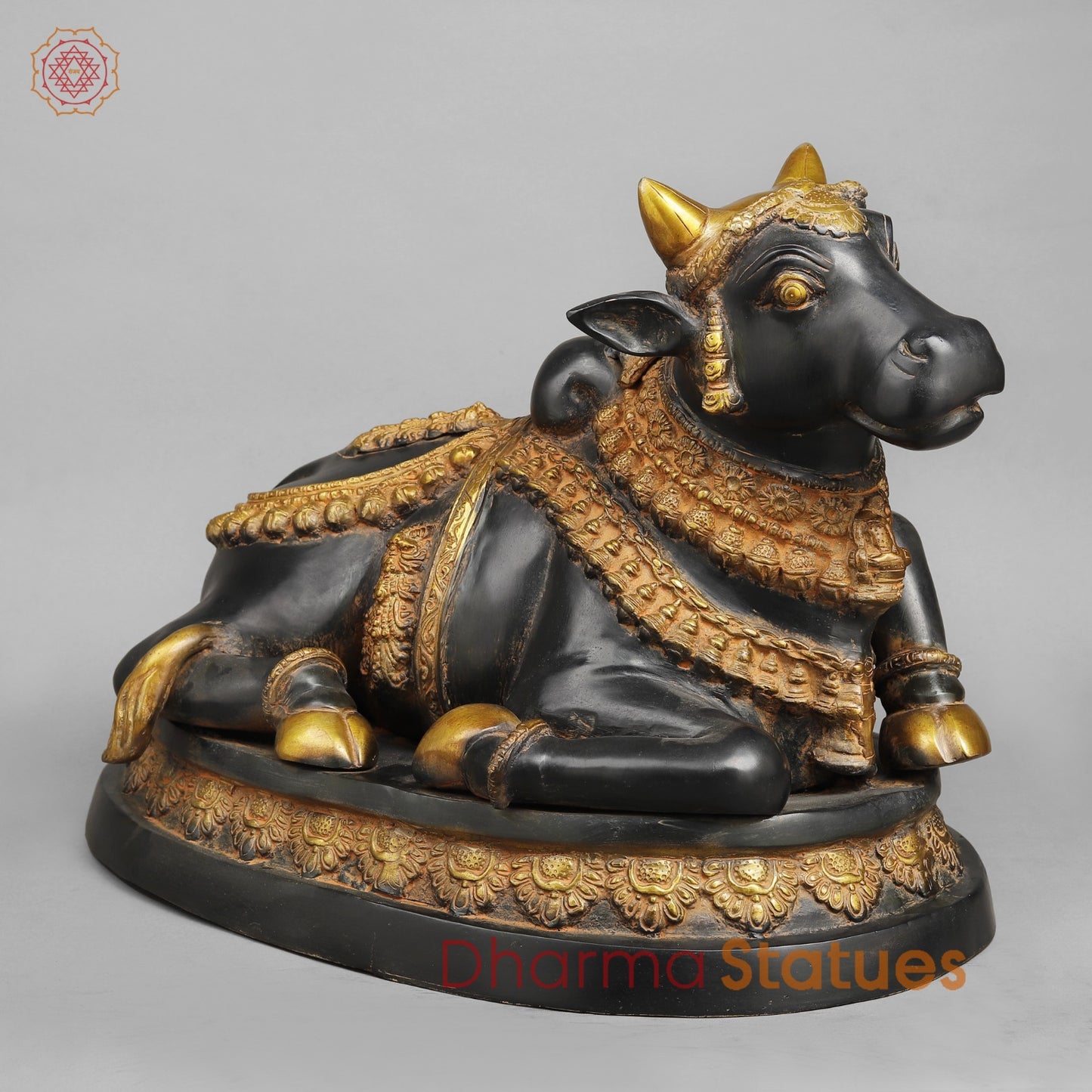 Brass Nandi seated, Deep Black and Gold finish 16.5”
