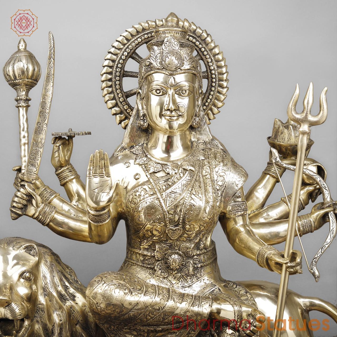 Brass Durga seated on Lion , Fine smooth finish 38”