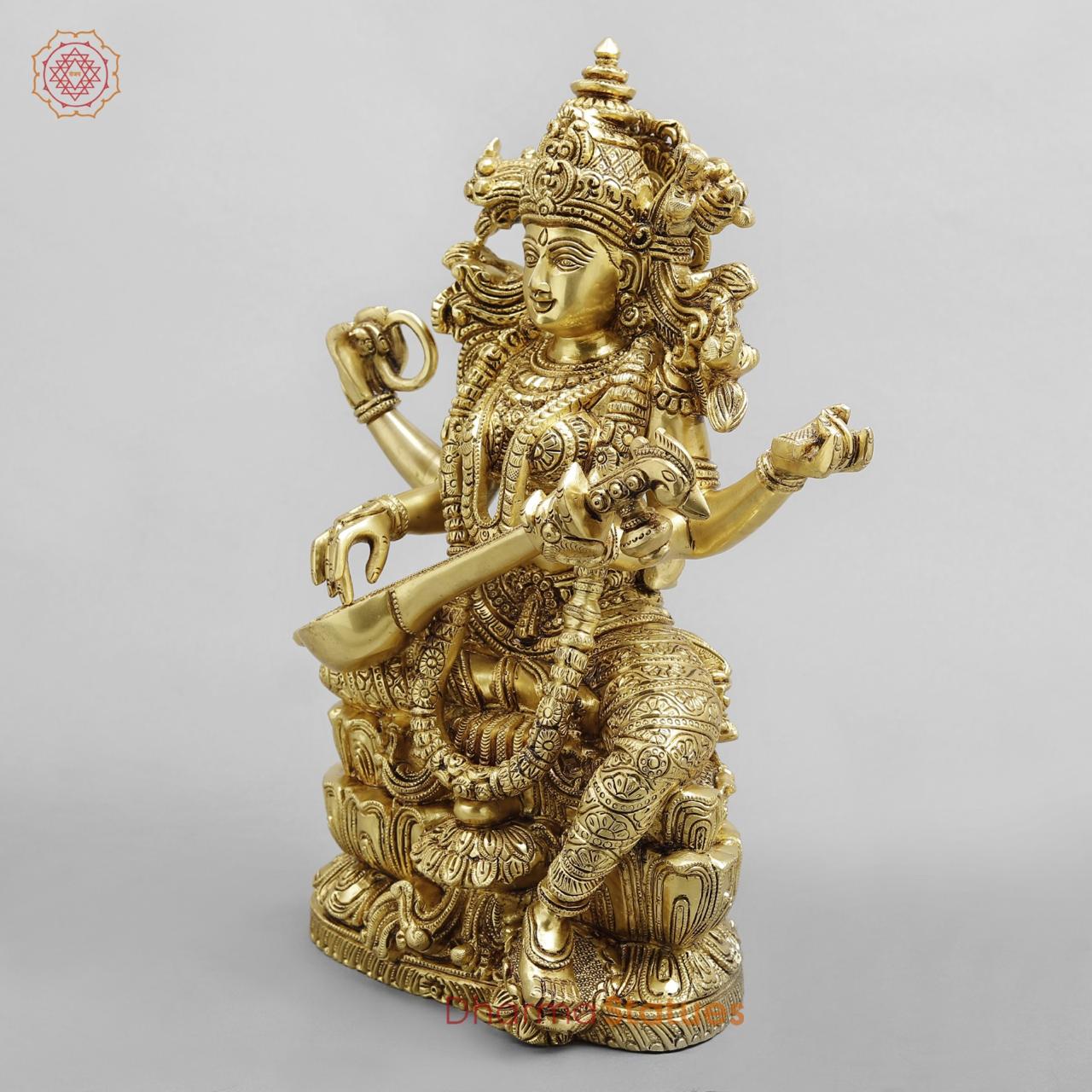 Brass Saraswati seated with fine Ornaments, superfine Golden finish 15”