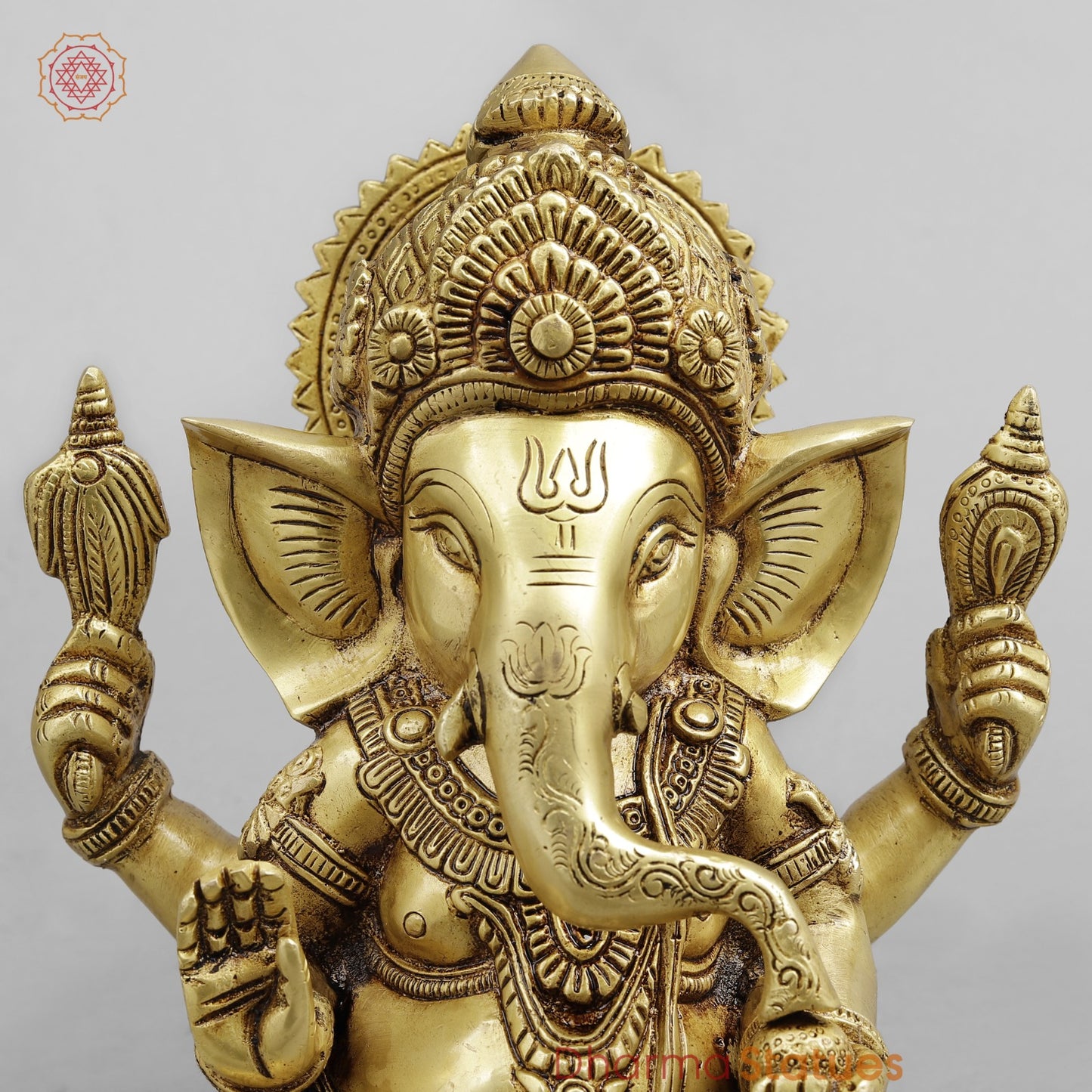 Brass Crown Ganesh seated, Golden Finish 8.5”