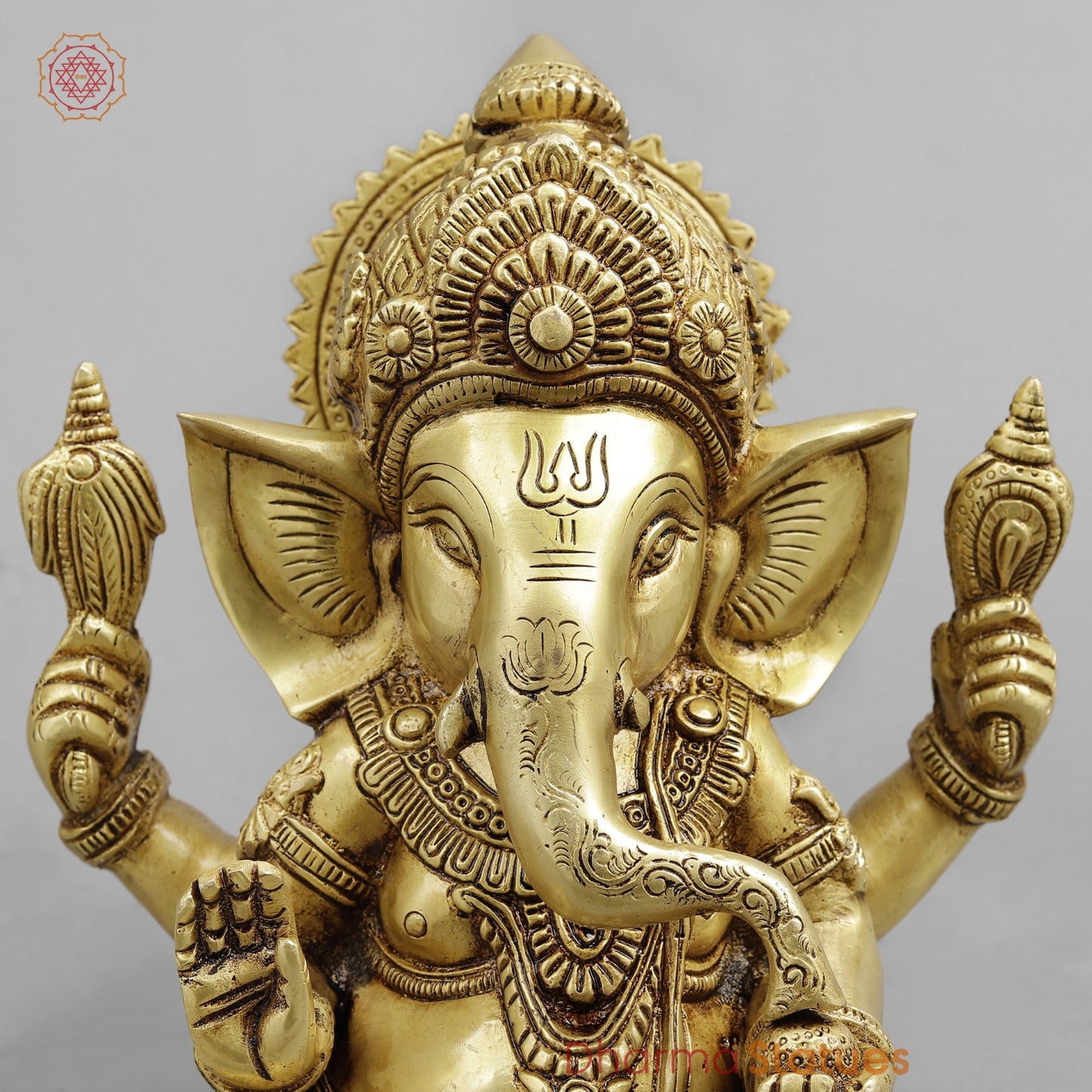 Brass Crown Ganesh seated, Golden Finish 8.5”