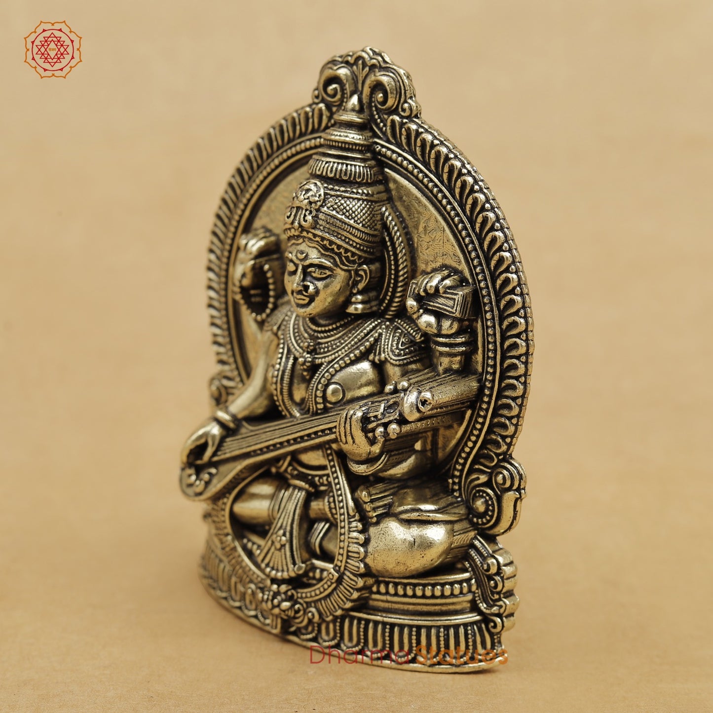 Brass Saraswati seated 4”