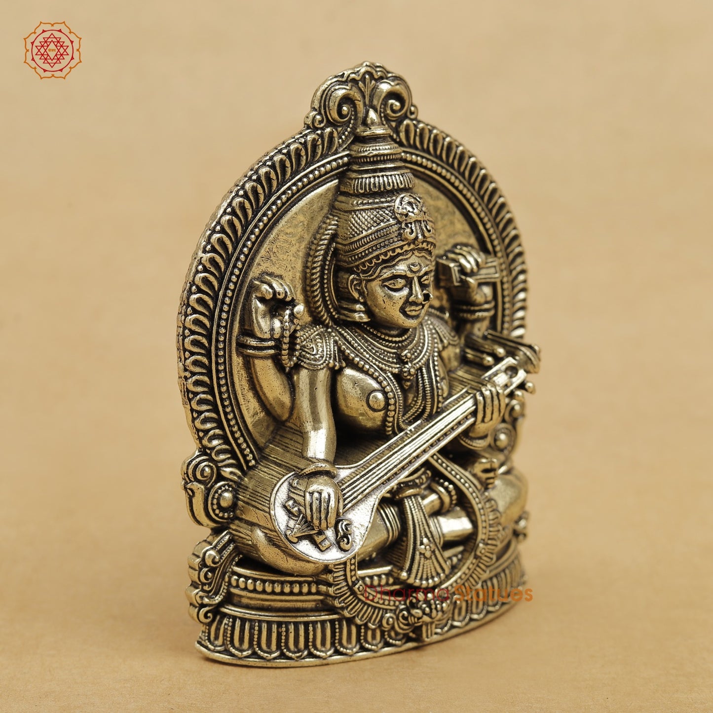 Brass Saraswati seated 4”