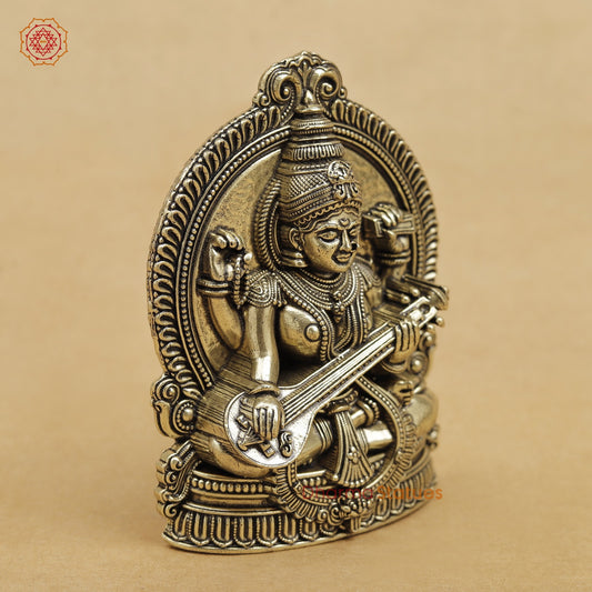 Brass Saraswati seated 4”