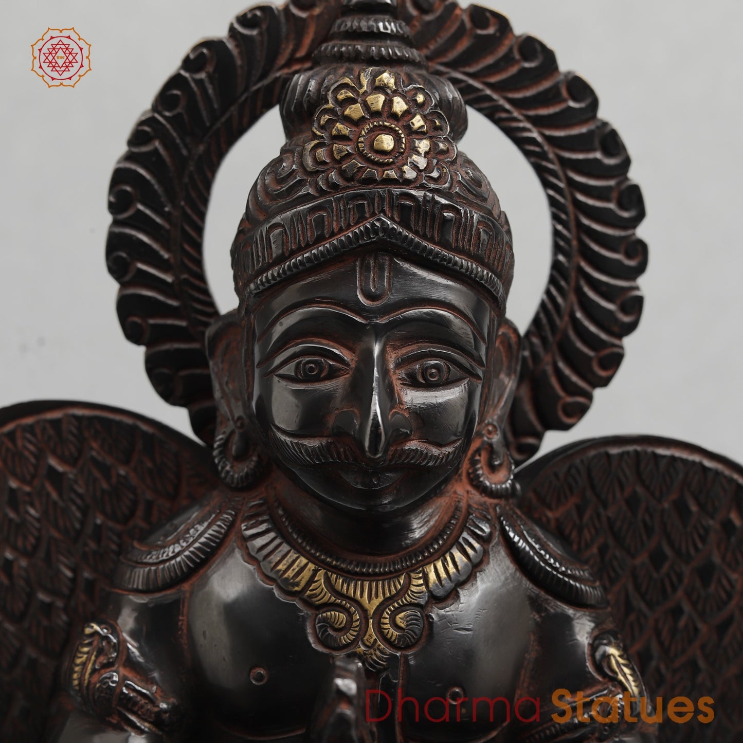 Brass Garuda Seated With Mantra in the Wings Fine, Royal Black with Red Hues Finish 12”