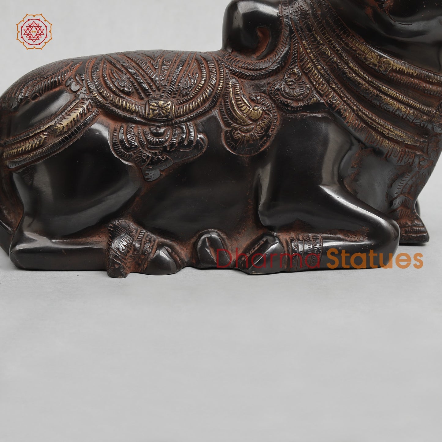 Brass Nandi seated Fine, Royal Black with Red Hues Finish 11”