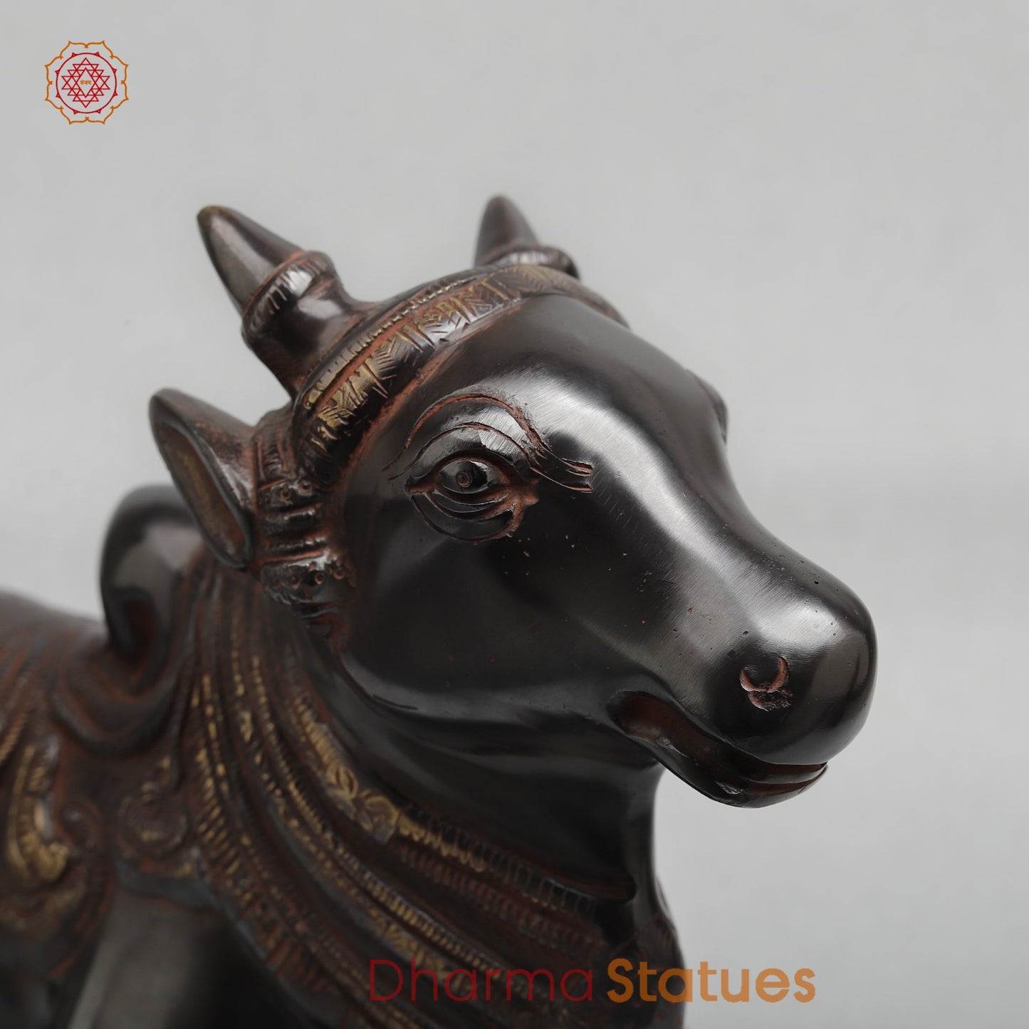 Brass Nandi seated Fine, Royal Black with Red Hues Finish 11”