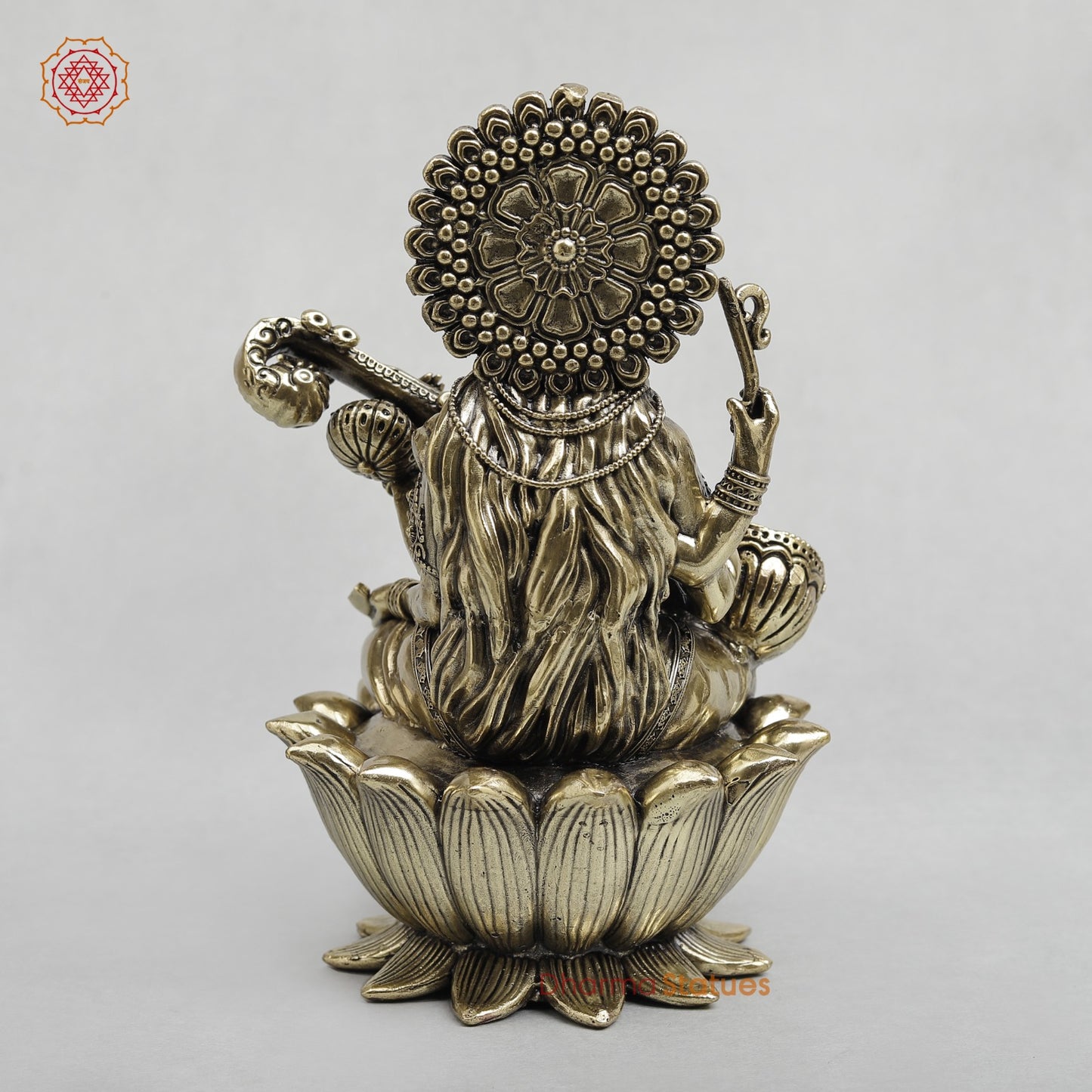 Brass Saraswati Seated on Lotus Fine 7.5”