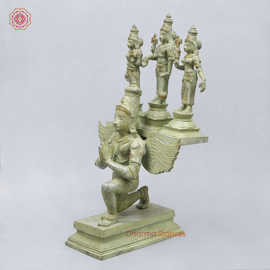 Brass Garuda vaahan Seated with Vishnu, Sridevi & Bhudevi Fine,Green Patina 17”